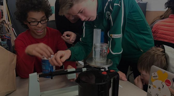 kids performing a science experiment