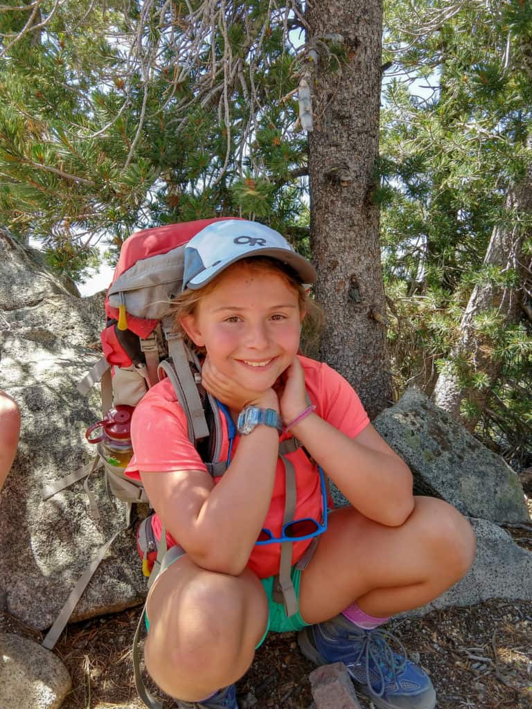 girls backpacking crew member smiling