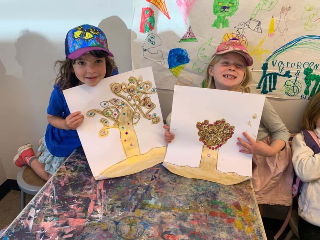 art campers showing off their pictures